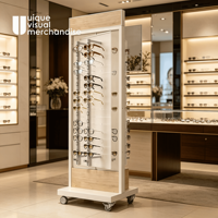 Présentoir à lunettes sur pied blanc en promotion avec roulettes pivotantes pour exposition de montures