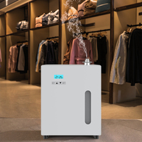 Diffuseur d'arôme élégant T2 Connexion commerciale HVAC Fenêtre visuelle pour espaces moyens et magasins de marque Huile de parfum pour diffuseur