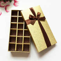 Caja de regalo de papel Kraft de lujo al por mayor, embalaje de chocolate impreso personalizado con forro de esponja y cinta