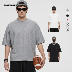 เสื้อยืดคอกลมทรงหลวมโอเวอร์ไซส์ ผ้าคอตตอน 100% คุณภาพสูง รับผลิตตามสั่ง พร้อมสกรีนโลโก้ ขายส่ง - Product Image 1