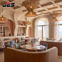 Ensemble table et chaises de restaurant J2S Hotel Design, sièges rembourrés en forme de baril, surface en bois ovale, solutions modernes pour les usines.