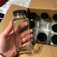Bouteille en verre carrée vide de 12 oz et 16 oz pour jus, bouteille de boisson carrée française avec couvercle noir – Vente en gros