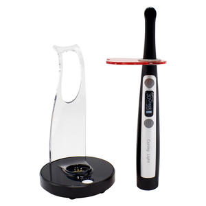 La <span class=keywords><strong>lampe</strong></span> de durcissement en résine de lumière de polymérisation dentaire de dauphin noir tourne <span class=keywords><strong>à</strong></span> 360 ° la <span class=keywords><strong>lampe</strong></span> de photopolymérisation dentaire Resina <span class=keywords><strong>lampe</strong></span> UV <span class=keywords><strong>lampe</strong></span> de dentisterie - Product Image 2