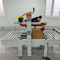 Machine de scellage de rubans semi-automatique à réglage manuel de la largeur, pour le conditionnement de petites lots