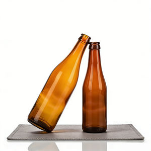 <span class=keywords><strong>Botella</strong></span> <span class=keywords><strong>de</strong></span> Vidrio Redonda Ámbar Recargable <span class=keywords><strong>de</strong></span> 330ml 540ml para Cerveza, Licores y Bebidas Espirituosas, con Tapa Corona, Empaque Personalizado <span class=keywords><strong>de</strong></span> Alta Calidad - Product Image 1