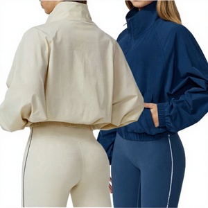 Conjunto Deportivo de 2 Piezas para Mujer, Tejido de Spandex y Nailon, Color Sólido, Cuello Alto, Manga Larga, Top Corto con Bolsillo - Product Image 1
