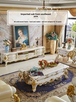 Meuble TV en bois massif de style européen, table basse de luxe en marbre blanc sculpté couleur or champagne, et armoire de sol combinée pour salon