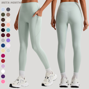 Leggings de cintura alta <span class=keywords><strong>con</strong></span> logo personalizado, sin costura frontal, sin efecto camel toe, <span class=keywords><strong>con</strong></span> bolsillos laterales, ligeros, efecto melocotón, control de abdomen, MOQ bajo - Product Image 1