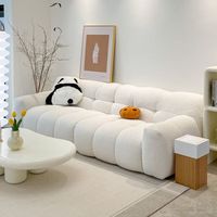 Canapé d'angle moderne en tissu crème, style décontracté et simple INS, idéal pour petit appartement, deux places tendance pour salon.
