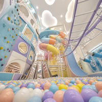 Équipement de terrain de jeu intérieur sur le thème des macarons, couleurs pastel, jeux d'escalade pour enfants, mur d'escalade, toboggan en acier inoxydable, fosse à balles, usage commercial