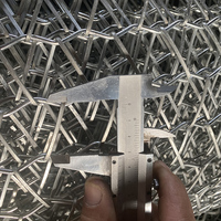 Bande transporteuse en spirale métallique flexible haute température de qualité alimentaire en acier inoxydable tressé pour copeaux de bois pour machine CNC