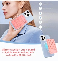 Support de téléphone à ventouse en silicone, support de téléphone pour miroir de douche, pliable, adhésif, accessoire pour smartphones pour selfies et vidéos