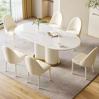 Ensemble de table et de chaises de salle à manger en acier carbone avec plateau en pierre moderne et luxueux (6 places) pour hôtel et usage domestique, construction durable