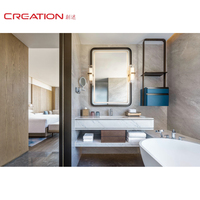 Ensemble de mobilier hôtelier sur mesure pour chambre king-size avec meuble TV et panneau mural en bois