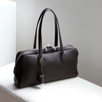 Sac fourre-tout à bandoulière en cuir de vachette pleine fleur pour femme, grande capacité, fermeture éclair géométrique, élégant et simple, vente en gros, OEM