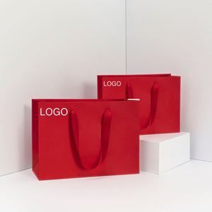 Sacs en papier mat de luxe personnalisés avec logo et poignées en ruban, couleur sur mesure pour boutiques de vêtements et cadeaux - Product Image 1