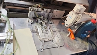 Machine d'emballage entièrement automatique d'occasion, idéale pour la production de jeans et de vêtements d'intérieur, permettant de réduire les coûts de main-d'œuvre et d'augmenter l'efficacité.