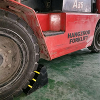 Cale de roue en caoutchouc noir 285*155*195mm, 6kg, équipement de sécurité routière pour voitures, camions et fourgonnettes - Vente en gros usine