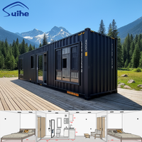 Maison conteneur noire de 40 pieds, conteneur maritime modifié avec un salon, une salle de bain et deux chambres