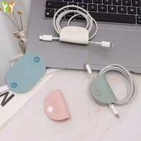Mini enrouleur de câbles en cuir PU de forme ovale, organisateur de cordons couleur macaron, attache-câbles réutilisable pour la maison et les voyages quotidiens (vente en gros)