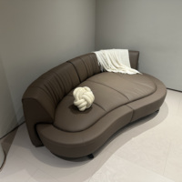 Canapé en cuir Salon Nouvelle fonction minimaliste italienne Designer Dossier de forme spéciale Canapé rotatif sur rail