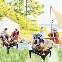 Barbecue au charbon de bois pliable et réglable avec un design moderne pour les fêtes de jardin en plein air et les petits pique-niques en noir