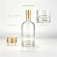 Bouteille de spiritueux en verre transparent rond de 700 ml, personnalisable, pour emballage de distillerie, approvisionnement en gros direct usine