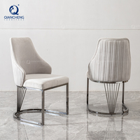 QIANCHENG maison de luxe dîner meubles fournisseur tissu accent moderne salle à manger table de velours à manger chaises