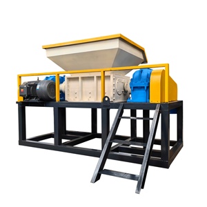 Broyeur à double arbre pour le recyclage de pneus usagés, de bandes transporteuses en caoutchouc, de tuyaux en caoutchouc et de joints de bride en caoutchouc - Product Image 1