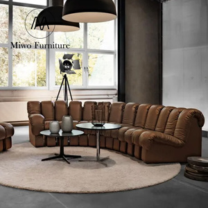 Canapé en cuir créatif de forme spéciale, design italien, arc serpentin, salon, hôtel, canapé modulaire central - Product Image 5