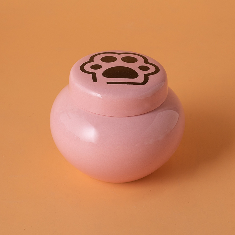 Round ash urn-pink-black paw print