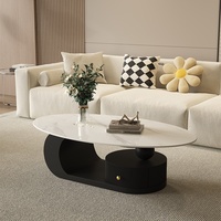 Table basse ovale moderne avec plateau en ardoise et structure en acier au carbone pour petits appartements et salons
