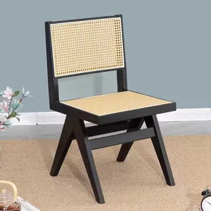 Sedia da pranzo in rattan con bracciolo,