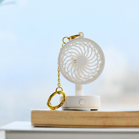 Ventilateur de table portable pour enfants, mini pendentif tendance 2026, mignon, pour l'extérieur, avec logo personnalisé, rechargeable par USB, moteur DC, commande par bouton