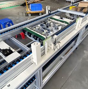 Pallet Handling Automation Solution Customized Rubber Belt Automated Conveyor System Adjustable for Palletizing Pallet Movement - Product Image 1