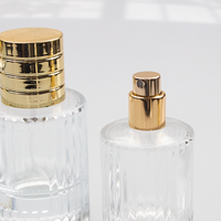 Vente en gros de flacons en verre pour cosmétiques, parfums et mascara, avec logo personnalisé, rayures verticales de luxe, bouchon en platine de haute qualité, pompe à vaporiser