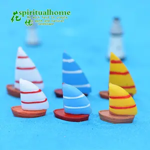 Hot Sale Wholesale Exquisite Fairy Sailing Boat Mini Red Flag Ship Small Statue Figurine Crafts Ornament Miniatures Decor.