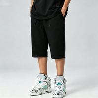 Shorts amples noirs pour hommes, longueur genou, avec double cordon de serrage, coupe ample, personnalisables, vente en gros