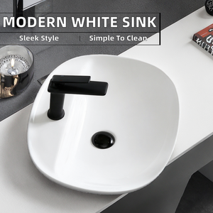 Lavabo de salle de bain rectangulaire moderne en céramique blanche de petite taille à poser sur comptoir avec fonction de nettoyage facile pour usage hôtelier - Product Image 2