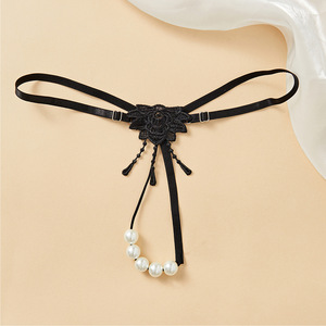 Tanga de perlas para mujer Ding Zhi Mei, accesorio íntimo sexy en blanco y negro para parejas - Product Image 2