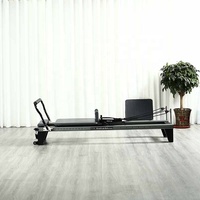 Queenlife noir alliage yoga usage commercial pleine piste aluminium réformateur pilates machine avec boîte et planche à sauter