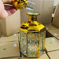 BM gros arabe luxe 150ml 250ml UV or Oud bouteilles fantaisie verre décanteur rechargeable échantillon d'huile verre affichage bouteille