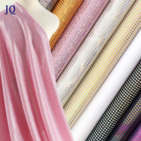 Stock de lots de verre sattré brillant hologramme irisé feuille métallique tissu poly spandex extensible dans les 4 sens jupe de danse tissu de maillot de bain