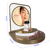 Support de présentation de cosmétiques et de soins de la peau en acrylique sur base dorée à l'huile moderne et haut de gamme, double couche, avec éclairage LED, table antivol pour parfums