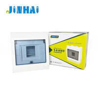 Boîtier de distribution encastré encastrable avec base métallique et porte en plastique mat, pour distribution électrique quatre fils