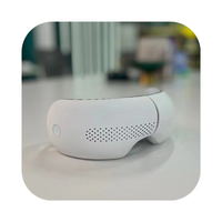 Appareil de massage oculaire intelligent électrique musical en gros, dispositif de relaxation oculaire intelligent avec fonction chauffante