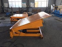 2025 Hontylift New Produire des tables élévatrices de plate-forme de niveleur de quai de chargement et de déchargement de conteneurs Rampes de chargement et de déchargement innovantes