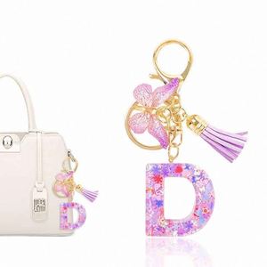 Colgante de Mariposa de Alta Calidad con 26 Letras Iniciales Inglesas, Llavero de Mariposa con Lentejuelas, Regalo para Niñas, Colgante Colorido para Bolsos - Product Image 1