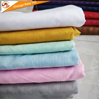 Tissu en microfibre de polyester léger gaufré à rayures 80-100 g/m² doux et respirant pour vêtements africains et produits textiles de maison