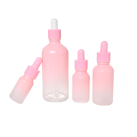 Flacon compte-gouttes en verre rose pour crème, parfum, produits capillaires, emballage de soins de la peau, forme ronde, sérigraphié, 5ml-50ml, boîtes
